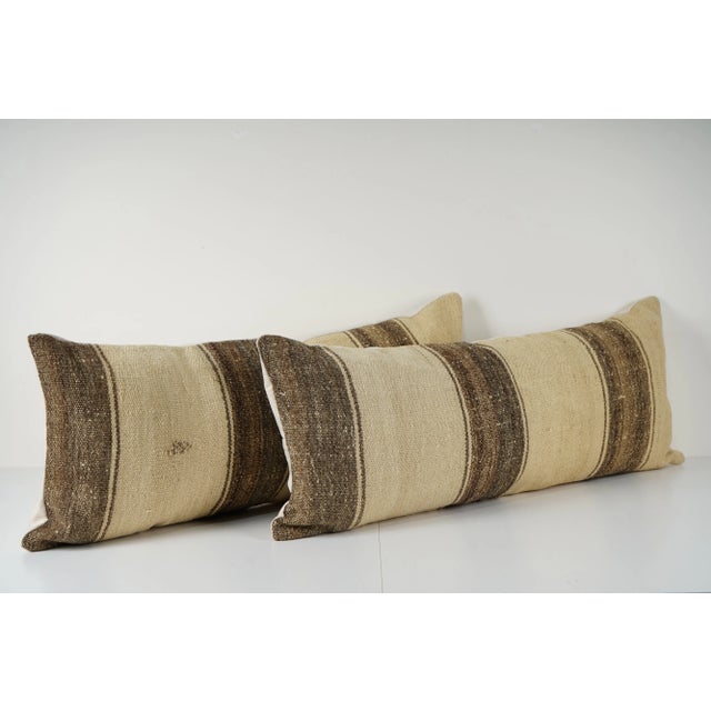 Turkish Kilim Pillow Cover - A Pair Elevate your home decor with these exquisite 16" x 40" pillow covers crafted from...