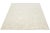Featuring a contemporary design on a natural ivory background, this hand-knotted Moroccan-style wool rug beautifully...