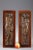 Pair of bronze bas-relief from the end of the 19th century, with brown patina, fixed on a wood veneer support,...