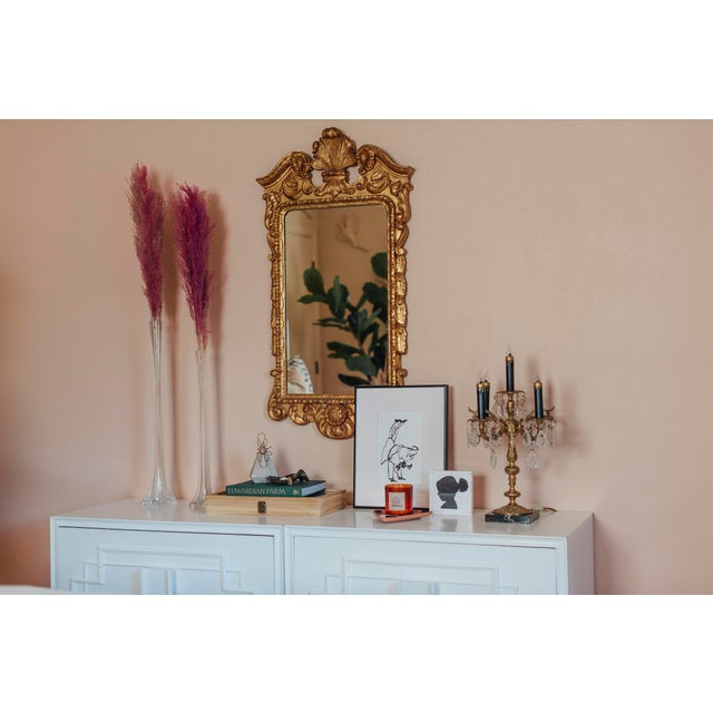 This listing is for an antique electric candelabra table lamp. It has five black arm "candles" with gold trio rims, a...