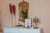This listing is for an antique electric candelabra table lamp. It has five black arm "candles" with gold trio rims, a...