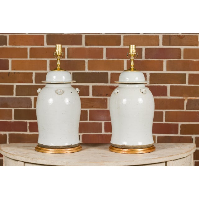Wood Asian Modern White Porcelain Lidded Urns on Gilded Bases - Pair For Sale - Image 7 of 12