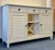 Charmingly coastal with a timeless cottage flair, this Basset Furniture louvered buffet server brings casual elegance and...