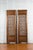 A pair of Chinese antique carved screens from the 19th century, with fretwork motifs and low-relief panels. Created in...
