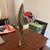 Add a touch of coastal charm to your home with this unique handcrafted metal fish sculpture. Made from sturdy, textured...