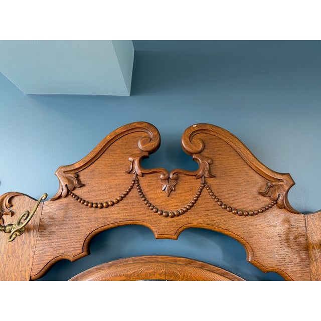 Lovely Antique Hall Tree with seating for 2, storage area under bench, Mirror and wall racks for hanging clothing. I...
