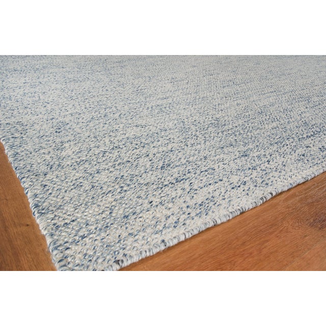 The Rhodes collection is a flatweave construction made of yarn dyed PET fibers. The subtle tweed appearance of the...