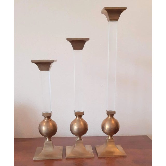 Very large tall Mid Century set of solid brass and lucite candlesticks. Set of three. HEAVY solid pieces. These are mid...