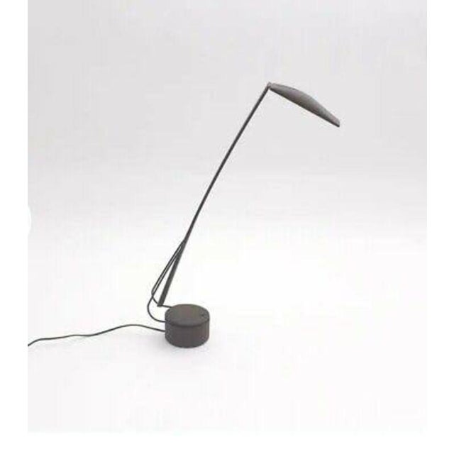 Dove desk lamp. Design by Mario Barbaglia and Marco Colombo. 1980s. Lamp with articulated arm and adjustable head....