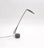 Dove desk lamp. Design by Mario Barbaglia and Marco Colombo. 1980s. Lamp with articulated arm and adjustable head....