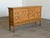 Danish oak brutalist sideboard credenza by Henning Kjærnulf for Nyrup Møbelfabrik, executed in solid oak with a warm,...