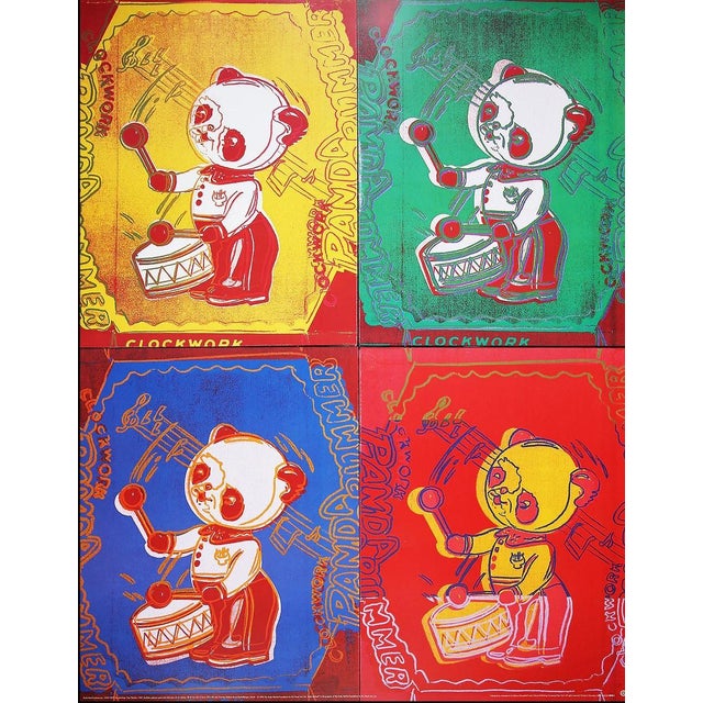 This print shows warhol's interpretation of a wind-up panda toy drummer in an expressive, graphic style. Presented in four...