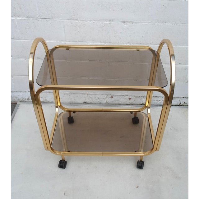 Vintage Gilded Aluminium Kaymet Bar Cart Trolley, 1970s, in Very Good conditions. Designed 1970 to 1979 This piece has an...