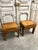 Pair of elm bedside tables by maison regain, circa 1970-80. Each bedside table features a drawer with a carved handle. The...
