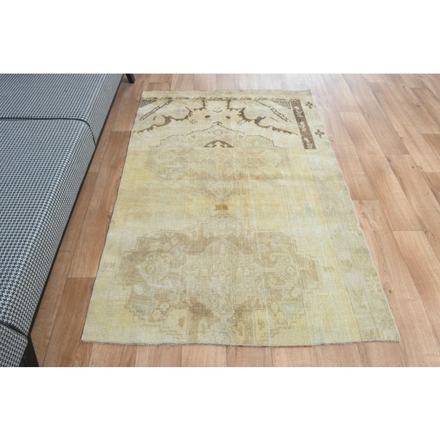 This vintage hand-knotted Runner rug is a semi-antique vintage area rug. The '70s Eastern region of Anatolian's unique rug...