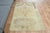 This vintage hand-knotted Runner rug is a semi-antique vintage area rug. The '70s Eastern region of Anatolian's unique rug...