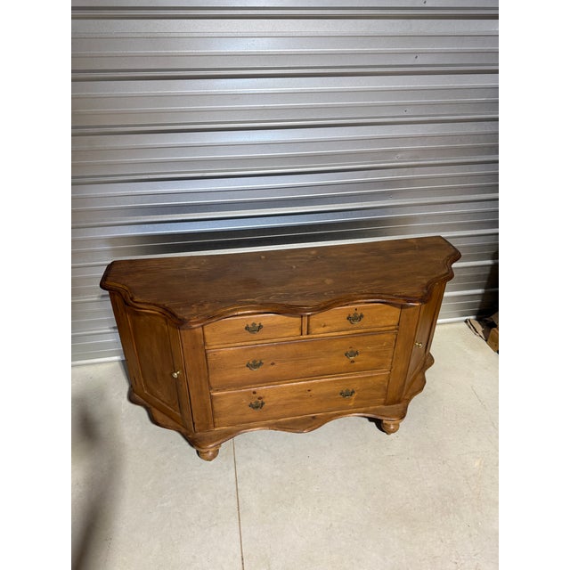 Antique Pine Serpentine Sideboard With Drawers and Cabinet Storage From England We found this piece in Straffordshire,...
