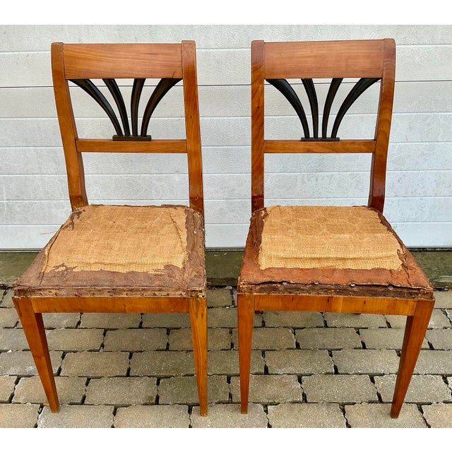 Pair of period Bidermeier cherrywood chair frames. Elegant form, beautiful color. Ebonised fan shaped back splats....