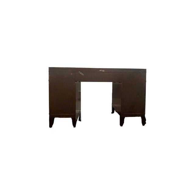 A fine English Georgian Revival pedestal desk, expertly crafted to reflect the classic proportions of 18th-century design....