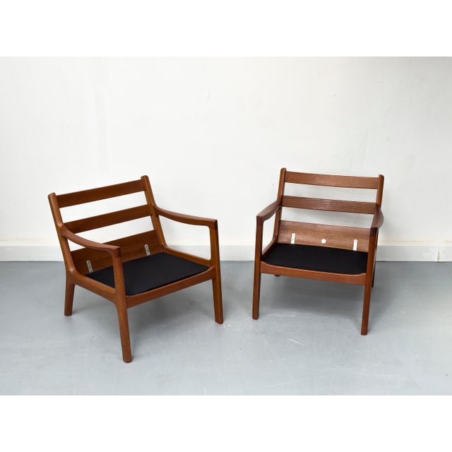 Set of two Senator lounge chairs in a beautiful design, crafted from solid teak, by Professor Ole Wanscher and...