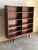 This grand open shelving unit features a clean double-column layout with a beautifully streamlined frame. The minimalist...