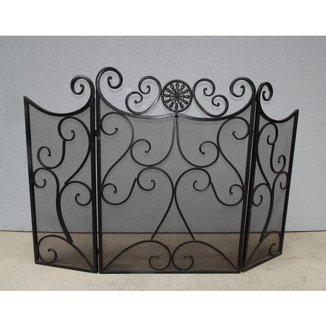 This vintage tri-fold fireplace screen is a great addition to any home. Made of durable hollow metal and finished in sleek...