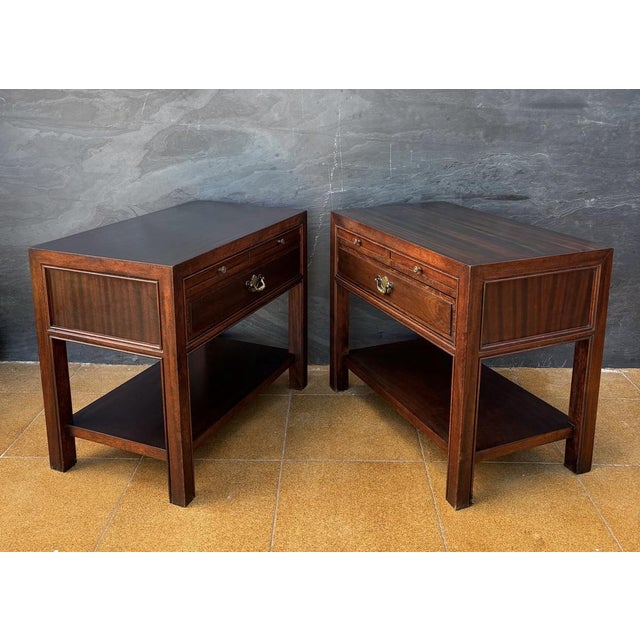 Pair of Spanish neoclassical style bedside tables crafted in solid wood, dating to the mid-20th century. Inspired by...