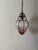 Each housing one-light. These were purchased from Sharon Osbourne's estate sell in Las Vegas. Very light pink Murano...