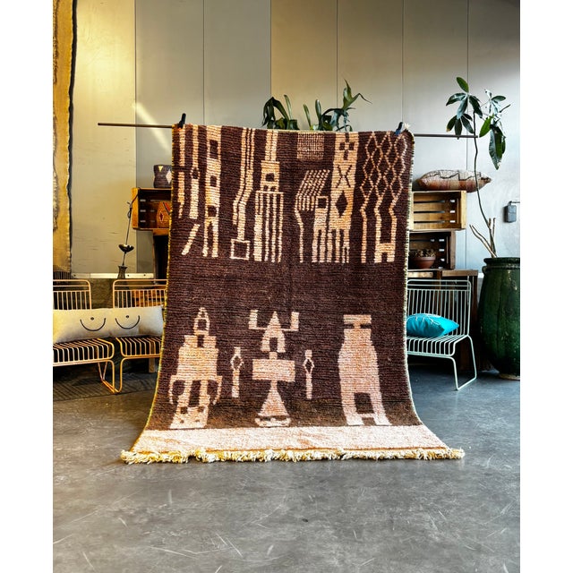 This authentic Moroccan Boujad rug is a striking example of Berber textile art from the Haouz and Middle Atlas regions....