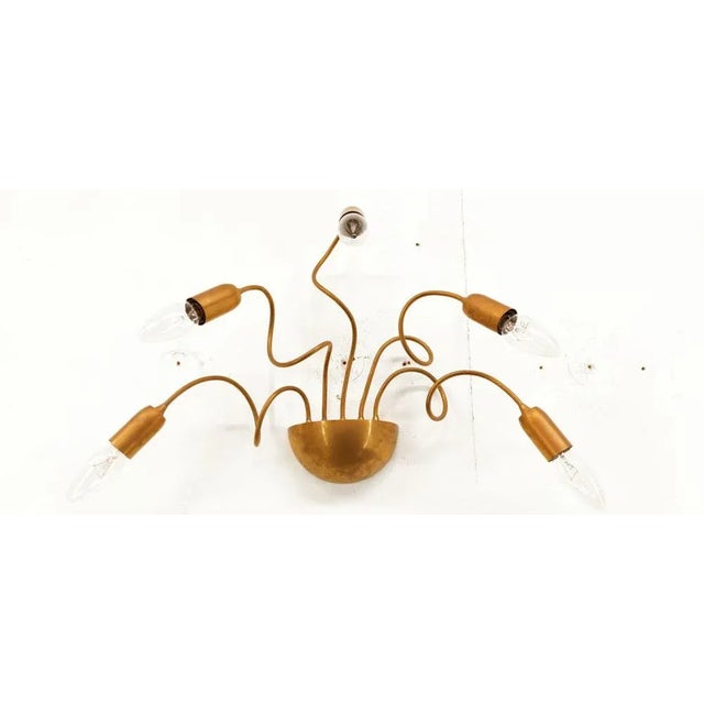 Adjustable Wall Light in Brass, in Very Good conditions. Designed 1980 to 1989 Up to 250V (Europe/UK Standard).The wiring...