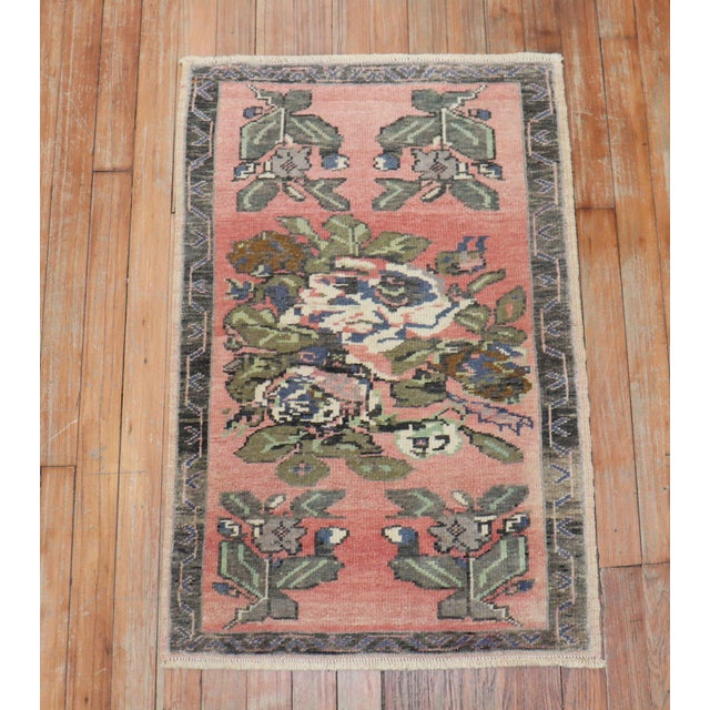 a mini size turkish mat size rug with a floral design on a pink ground Details rug no. y1849 size 1' 10" x 2' 10" (56 x 86...