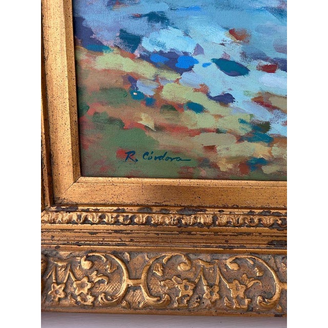 Pretty oil on canvas featuring a house on the water. Ornate gilt wood carved frame. overall: 34”W x 30”H x 3”D canvas:...