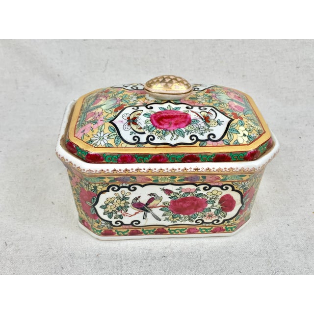 Vintage pink and gold lidded box. Chinoiserie design featuring birds and flowers. Perfect for display or to use to hold...