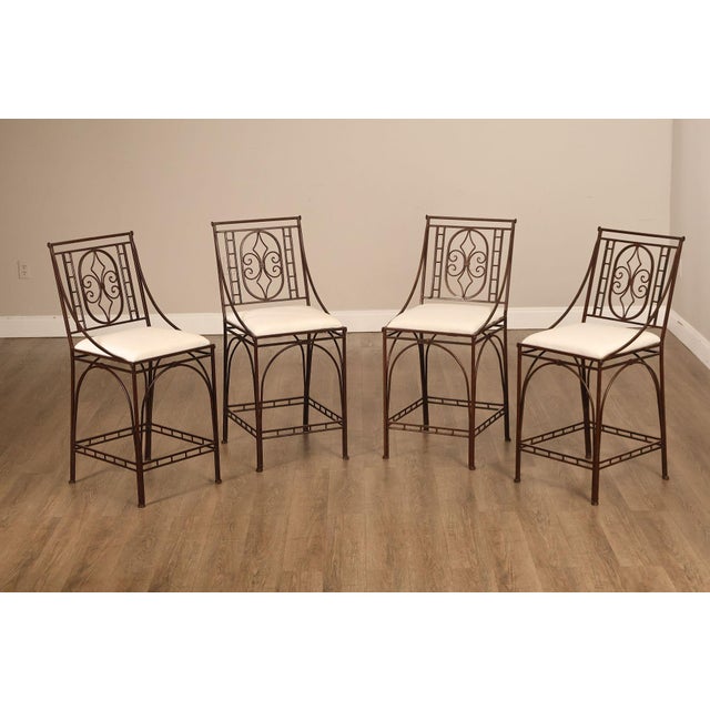 High Quality Set of Four Geometric Steel Frame Counter Stools with Open Scroll Work Backrests and Upholstered Seats