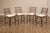 High Quality Set of Four Geometric Steel Frame Counter Stools with Open Scroll Work Backrests and Upholstered Seats