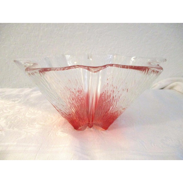 Mid-Century stylish decorative thick glass bowl featuring a pink grapefruit-shaded organic raised design around perimeter...