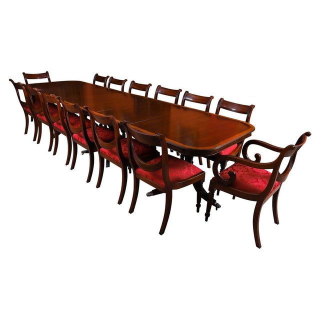 This is a superb dining set comprising a superb vintage 12ft Regency Revival dining table with a stunning set of fourteen...