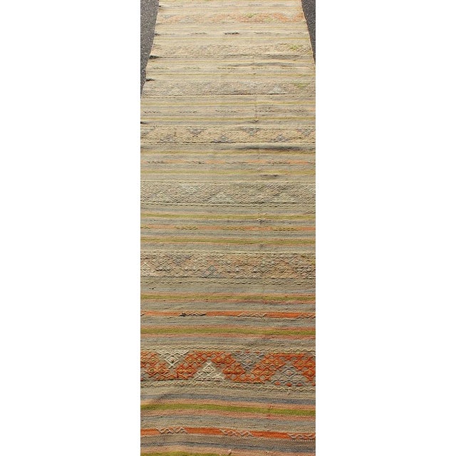 Measures: 2'9 x 9'7 Vintage Turkish Kilim Rug with Stripe Design in Soft Earth Tones 2'9 x 9'7. Keivan Woven Arts /...
