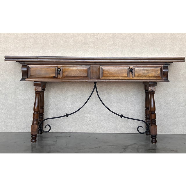 20th century Spanish console fold out farm table Works as both a dining table and console. Extra measures: 28.35" wide...
