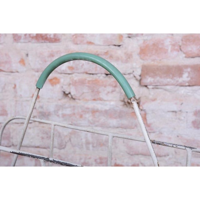 This stylish magazine rack dates back to the 1950s and was manufactured in Czechoslovakia, where it represents a highly...