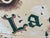 Paint 1930s French Provincial Antique Painted Metal Trade Sign 'La Poterie' For Sale - Image 7 of 10