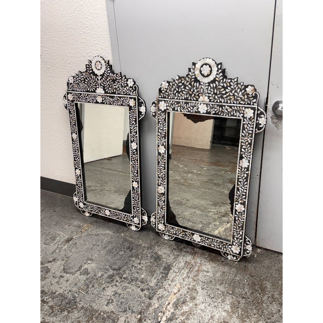 Design Plus Gallery presents a Pair of Moroccan Style Mother-of-Pearl Inlaid Floral Wall Mirrors. These decorative wall...