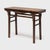 This rustic console table from China's Shanxi province follows the classic recessed-leg form, defined by its inset legs,...