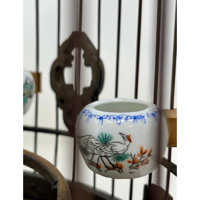 This beautiful birdcage is work of art in itself. Rare find featuring a double ended carved dragon perch, hand painted...