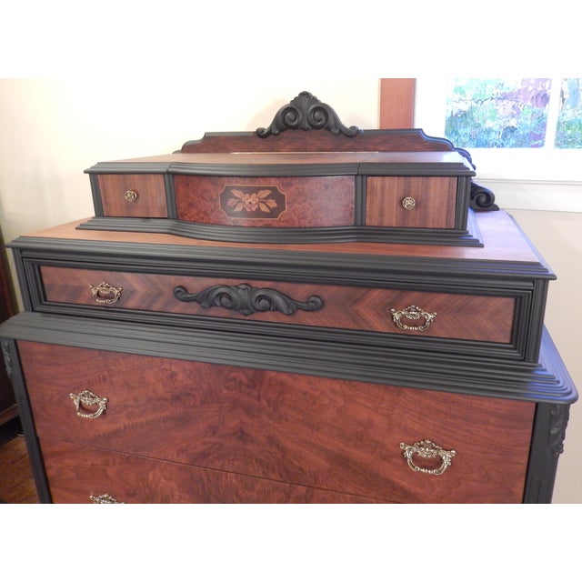 Stunning 1920's flame walnut high boy dresser, hand-crafted by the Sligh furniture company. Renown as a high end American...