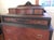 Stunning 1920's flame walnut high boy dresser, hand-crafted by the Sligh furniture company. Renown as a high end American...