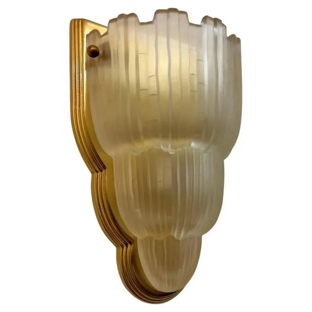 This pair of French Art Deco sconces are known as the "Waterfall" from the 1930's by Marius Ernest Sabino (1878-1961) in...