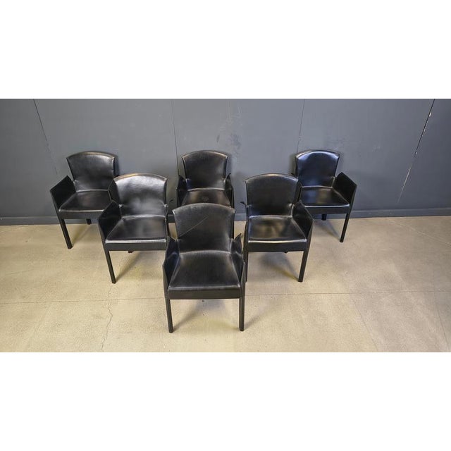 Vintage black leather dining chairs by Frag Italy. Beautiful and timeless design dining chairs, a great and less costly...