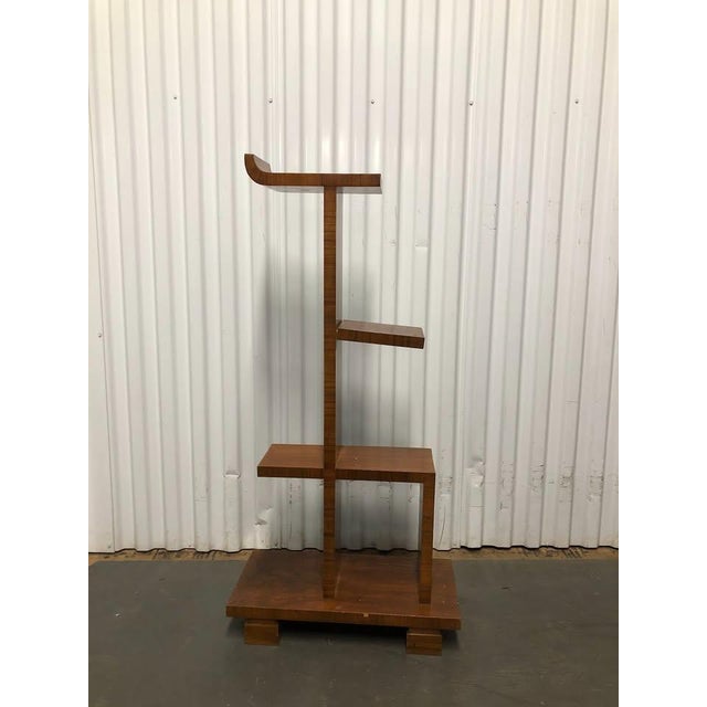 Rare, multi-level mahogany étagère—where form meets function in a striking, geometric silhouette: Key Features &...