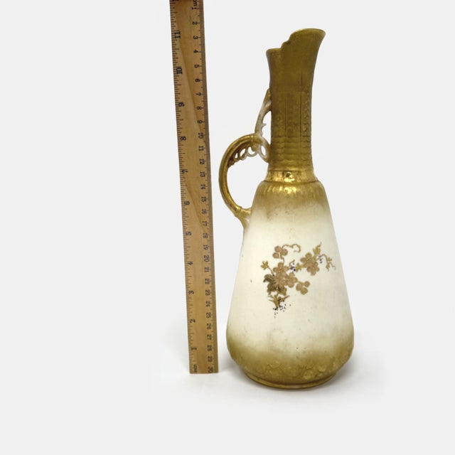 Add a touch of late 19th-century elegance to your collection with this stunning hand-painted ewer from the renowned...